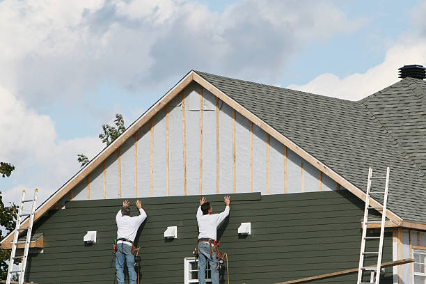 Professional Siding Replacement technician working in Covington, OH